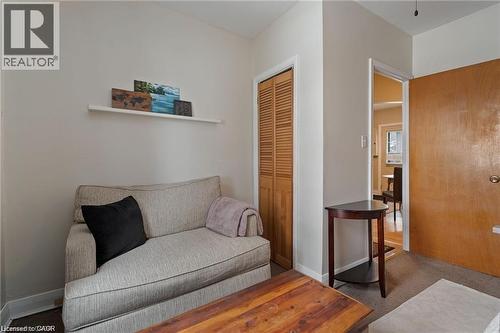 Interior room featuring light-colored walls and carpeted flooring - 2 Mill Street E, York, ON 