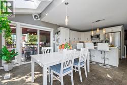 Bright Dining Space that Flows Effortlessly to the Outdoor Patio - 