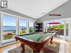 Flexible Living Area Perfect for a Family or Games Room. Open the French Glass Doors That Lead Out to the BBQ Sundeck for an Open Entertaining Space - 