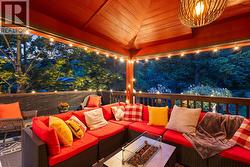 Cozy Covered Deck Designed for Year Round Outdoor Living - 