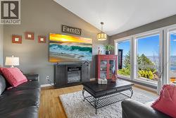 Vaulted Ceilings Paired with Beautiful Lake Views - 