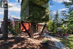 The Kind of Backyard Where Kids Grow Up — Complete with a Tree Fort - 
