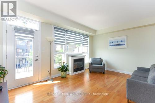 51 Drouin Avenue, Ottawa, ON - Indoor Photo Showing Living Room With Fireplace