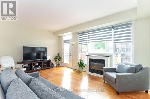 51 Drouin Avenue, Ottawa, ON - Indoor Photo Showing Living Room With Fireplace
