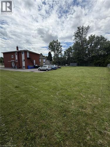 Expansive grassy lot with mature perimeter trees - 26 Carnaby Crescent, Kitchener, ON 