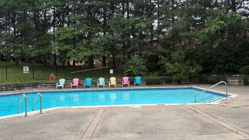 211-20 Cherrytree Drive, Brampton, ON - Outdoor With In Ground Pool With Backyard