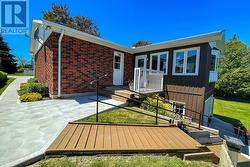 rear access from garage and stairs to yard - 