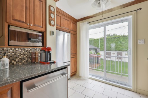Kitchen - 8377 Rue Marius-Barbeau, Laval (Saint-François), QC - Indoor Photo Showing Kitchen