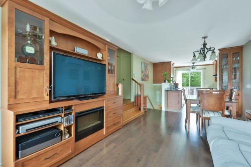Overall view - 8377 Rue Marius-Barbeau, Laval (Saint-François), QC - Indoor Photo Showing Living Room With Fireplace