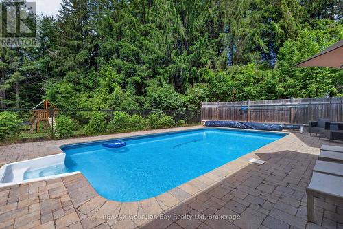 19 Kingfisher Crescent, Tiny, ON - Outdoor With In Ground Pool With Backyard