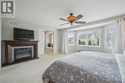 Primary Bedroom with electric fireplace - 79 Zieman Crescent, Cambridge, ON 