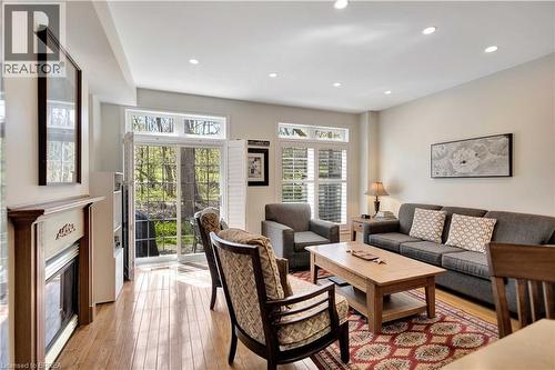 Living area featuring wood-finish flooring - 120 Beddoe Drive Unit# 6, Hamilton, ON 