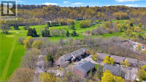Expansive golf course setting featuring manicured greens and mature trees - 120 Beddoe Drive Unit# 6, Hamilton, ON 