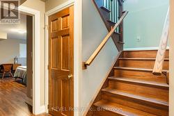 Wide staircse to the lower level. - 
