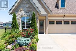 Stone Front with Ramped entrance, 2 Car Garage - 