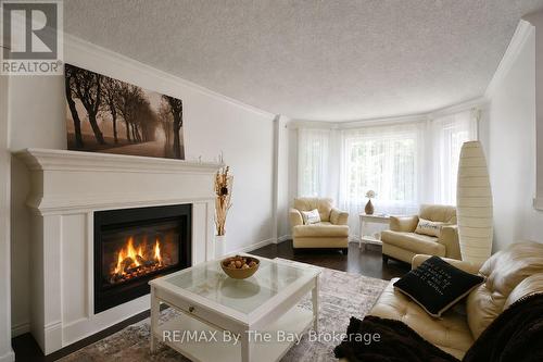 Gas Fireplace In Main Living Room - 2 Birchmount Circle, Wasaga Beach, ON 