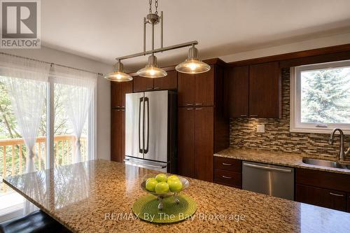 Kitchen with Patio Doors to Deck and Yard - 2 Birchmount Circle, Wasaga Beach, ON 