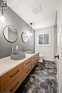 Dual vessel sinks with wall-mounted faucets - 