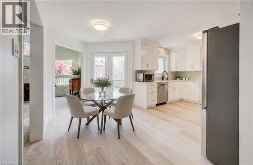 Virtually Staged to add table and chairs - 464 Northlake Drive, Waterloo, ON - Indoor Photo Showing Dining Room