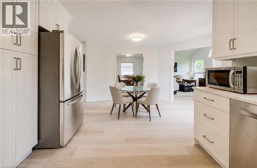 Virtually Staged to add table and chairs - 464 Northlake Drive, Waterloo, ON - Indoor Photo Showing Other Room