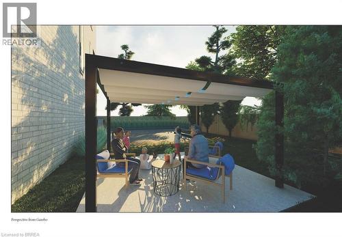 The property features an outdoor patio area with a pergola, a paved surface, and a grassy lawn - 759 Maple Avenue, Burlington, ON 