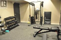 Dedicated exercise space featuring durable rubber flooring - 
