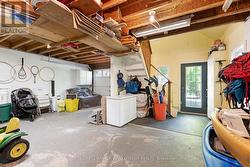 Separate door into garage leads up to loft - 
