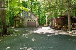 Detached garage-workshop has hydro & finished loft - 