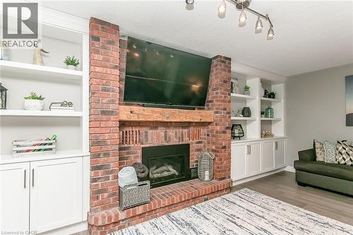 1774 Old Mill Road, Kitchener, ON - Indoor Photo Showing Living Room With Fireplace