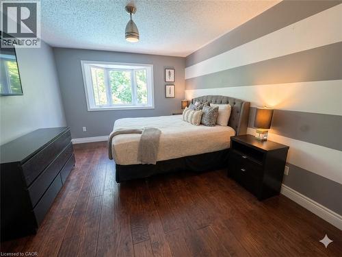Bright Primary Bedroom with views to backyard - 1774 Old Mill Road, Kitchener, ON - Indoor Photo Showing Bedroom