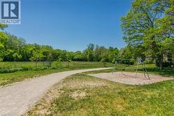 Swings and baseball field nearby - 