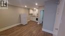 Kitchen: sink, stove, fridge + living/bedroom area - 181 King Street E Unit# 8, Kitchener, ON 
