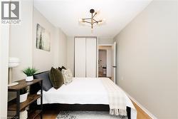Recessed lighting accentuating a modern sputnik chandelier - 