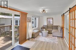Main Living Room w sliding glass door to deck - 