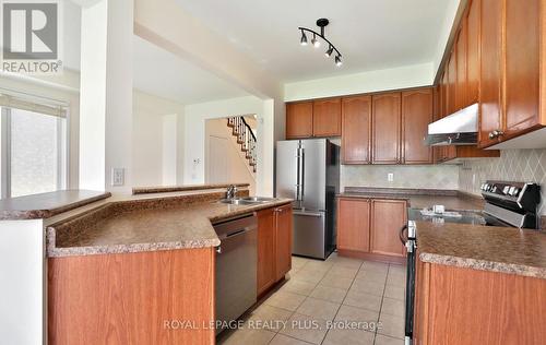 3877 Stardust Drive, Mississauga, ON - Indoor Photo Showing Kitchen With Double Sink