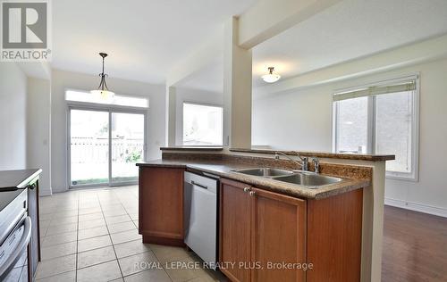 3877 Stardust Drive, Mississauga, ON - Indoor Photo Showing Kitchen With Double Sink
