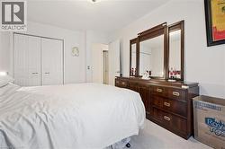 White interior walls with light-colored carpeting - 