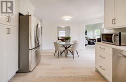 Virtually Staged to add table and chairs - 