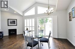 Vaulted ceiling interior with wood-finish flooring - 