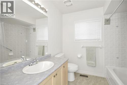 Bathroom vanity with an oval sink and chrome faucet - 95 Drinkwater Drive, Cambridge, ON - Indoor Photo Showing Bathroom
