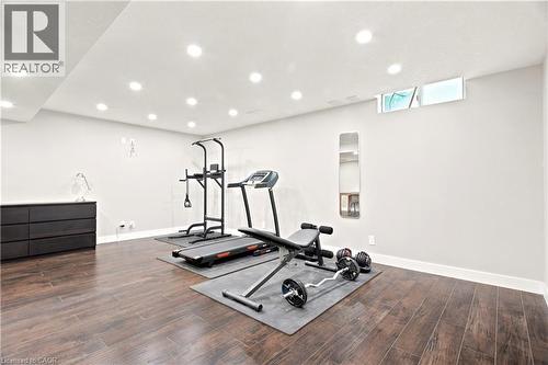Spacious interior area featuring wood-finish flooring, recessed ceiling lighting, and light-toned walls - 175 Siebert Avenue Unit# 9, Kitchener, ON 
