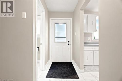 Entryway featuring white tile flooring - 175 Siebert Avenue Unit# 9, Kitchener, ON 