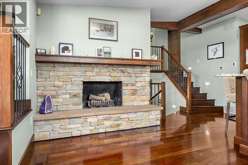 Fireplace in kitchen/dining - 13707 Watson Drive, Coldstream, BC 