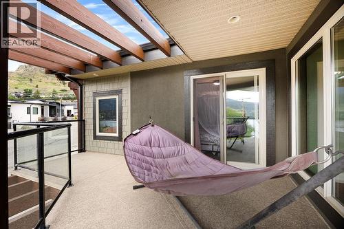 deck off bedroom #2. Lucky kid! - 13707 Watson Drive, Coldstream, BC 