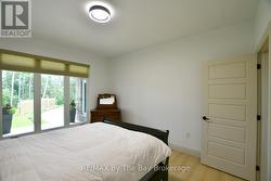 Main Floor Bedroom/ Office/ Den - 