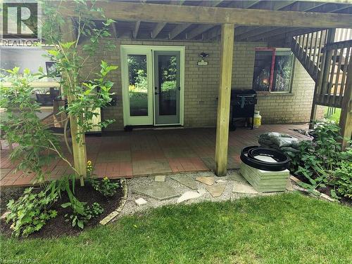 Entrance to the apartment with outdoor patio and BBQ - 561 Marl Meadow Crescent Unit# Lower, Kitchener, ON 