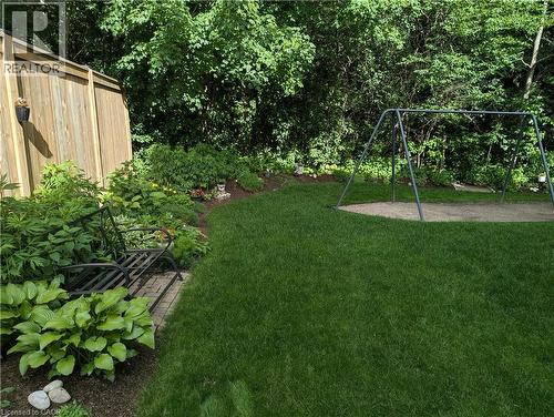 Green backyard with forest background - 561 Marl Meadow Crescent Unit# Lower, Kitchener, ON 