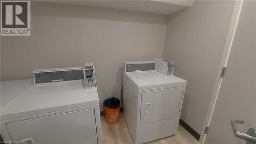 Common area in-building laundry area - 2 coin dryers - 181 King Street E Unit# 9, Kitchener, ON 