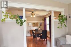 Open archway featuring detailed millwork and integrated shelving - 