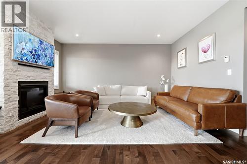 3504 Green Lily Road, Regina, SK - Indoor Photo Showing Living Room With Fireplace